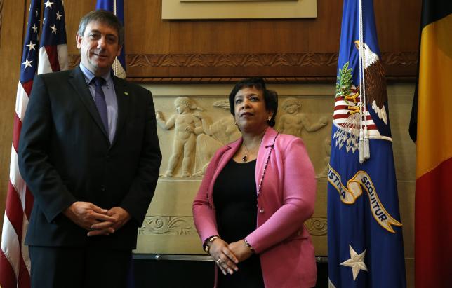 U.S. Attorney General Loretta Lynch (R) welcomes Belgian Deputy Prime Minister and Minister of Security and Interior Jan Jambon at the Justice Department in Washington March 31, 2016.   REUTERS/Gary Cameron